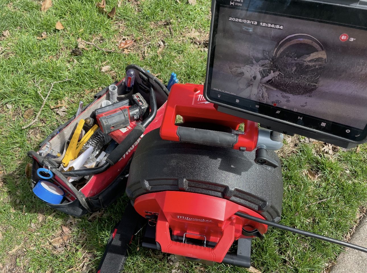 Drain-clearing and pump equipment staged on site — DE Plumbing, Cincinnati