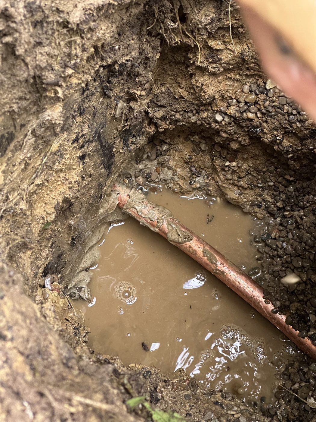 Repairing a copper water line below grade — DE Plumbing, Cincinnati